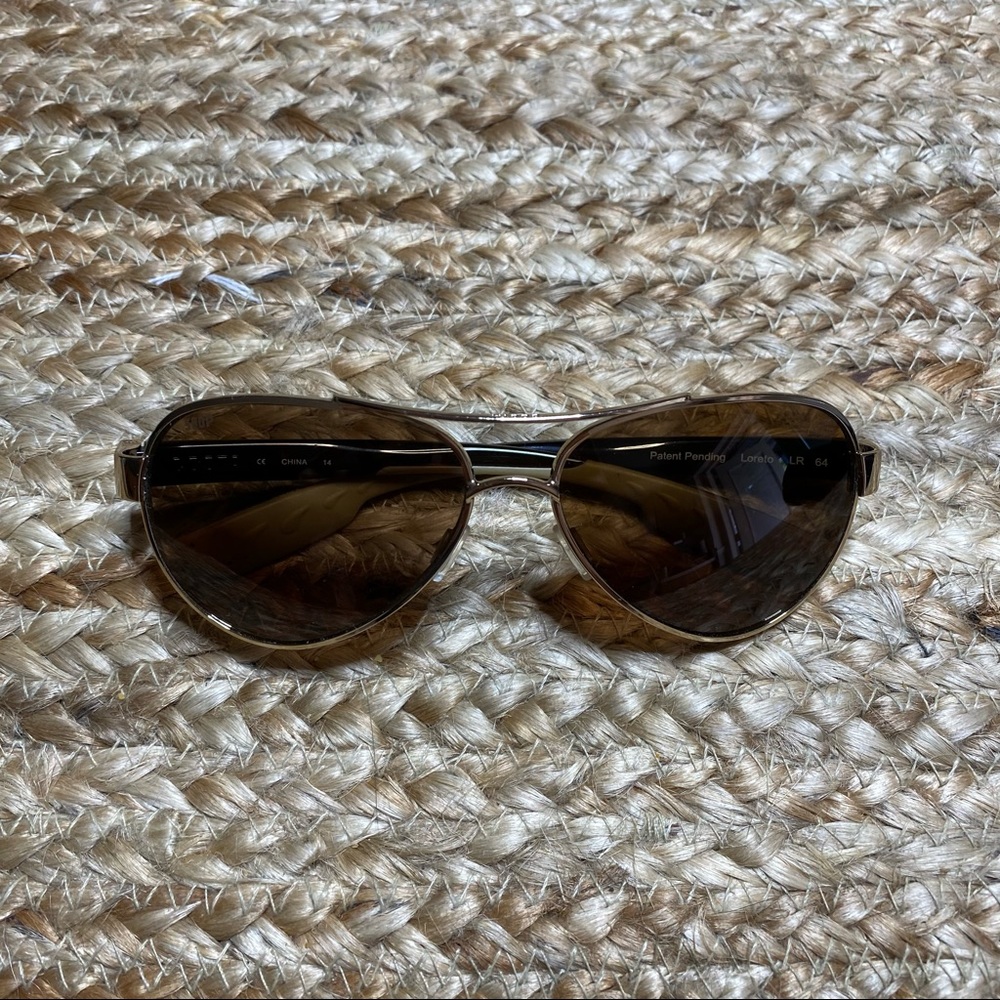Costa Del Mar Loreto 580 plastic amber polarized lenses, amber and gold fames